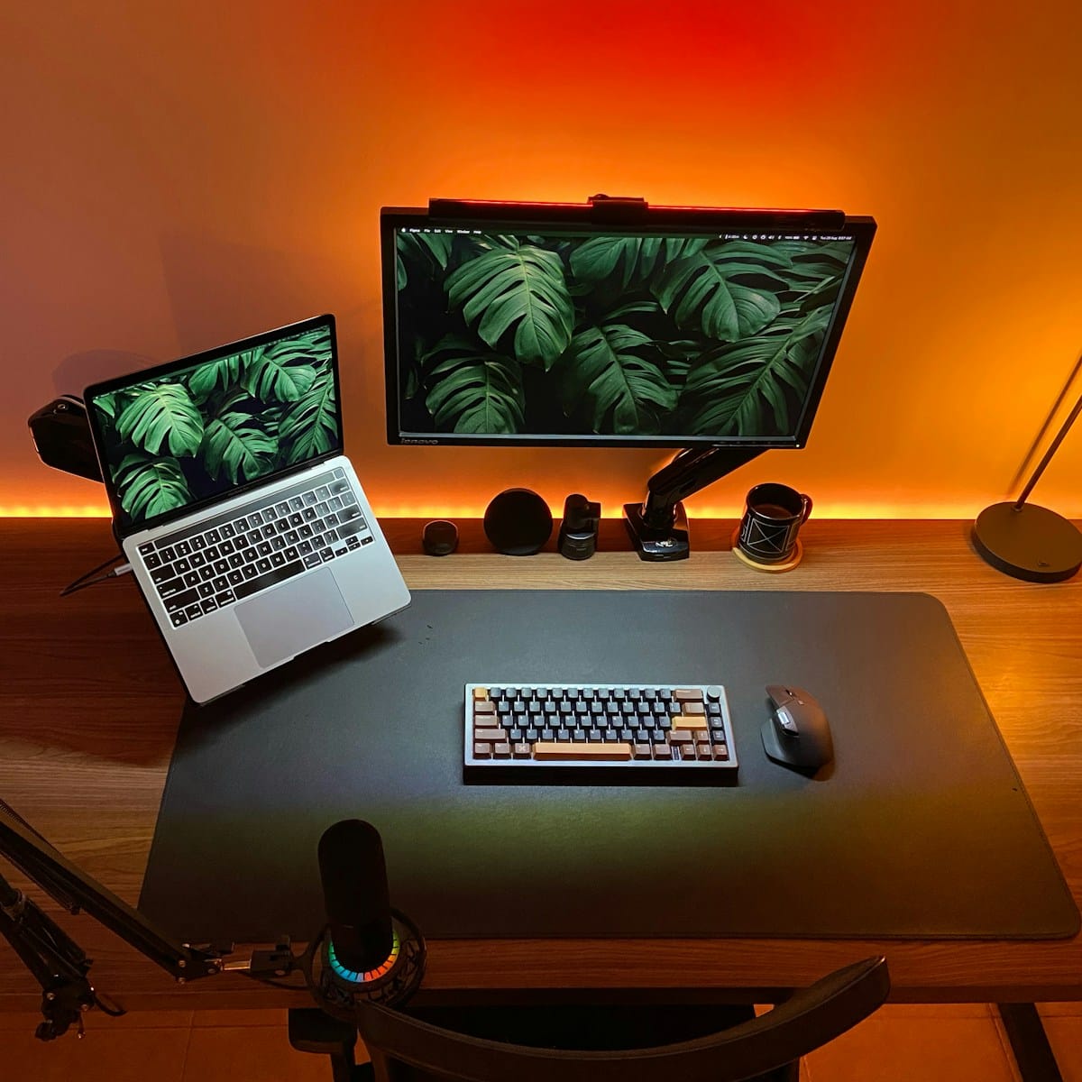 a laptop computer sitting on top of a wooden desk